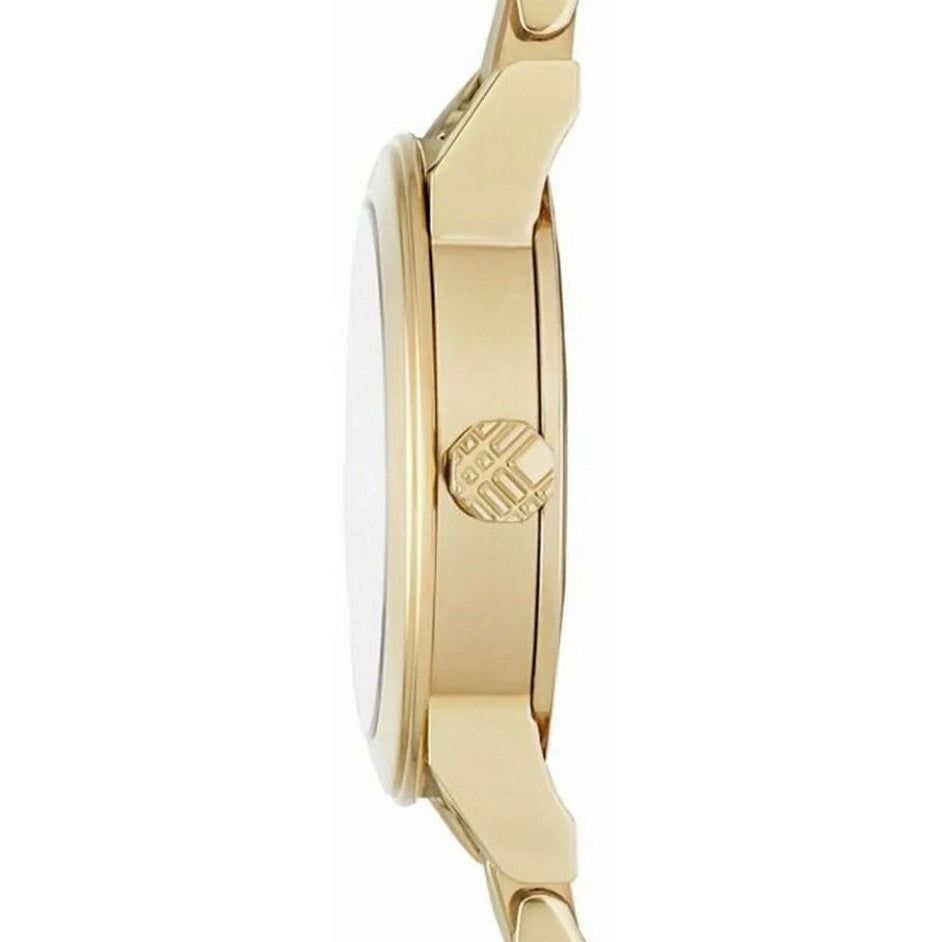A side profile view of the Burberry BU9234 watch, showing the slim profile of the gold stainless steel case and the detailed crown.