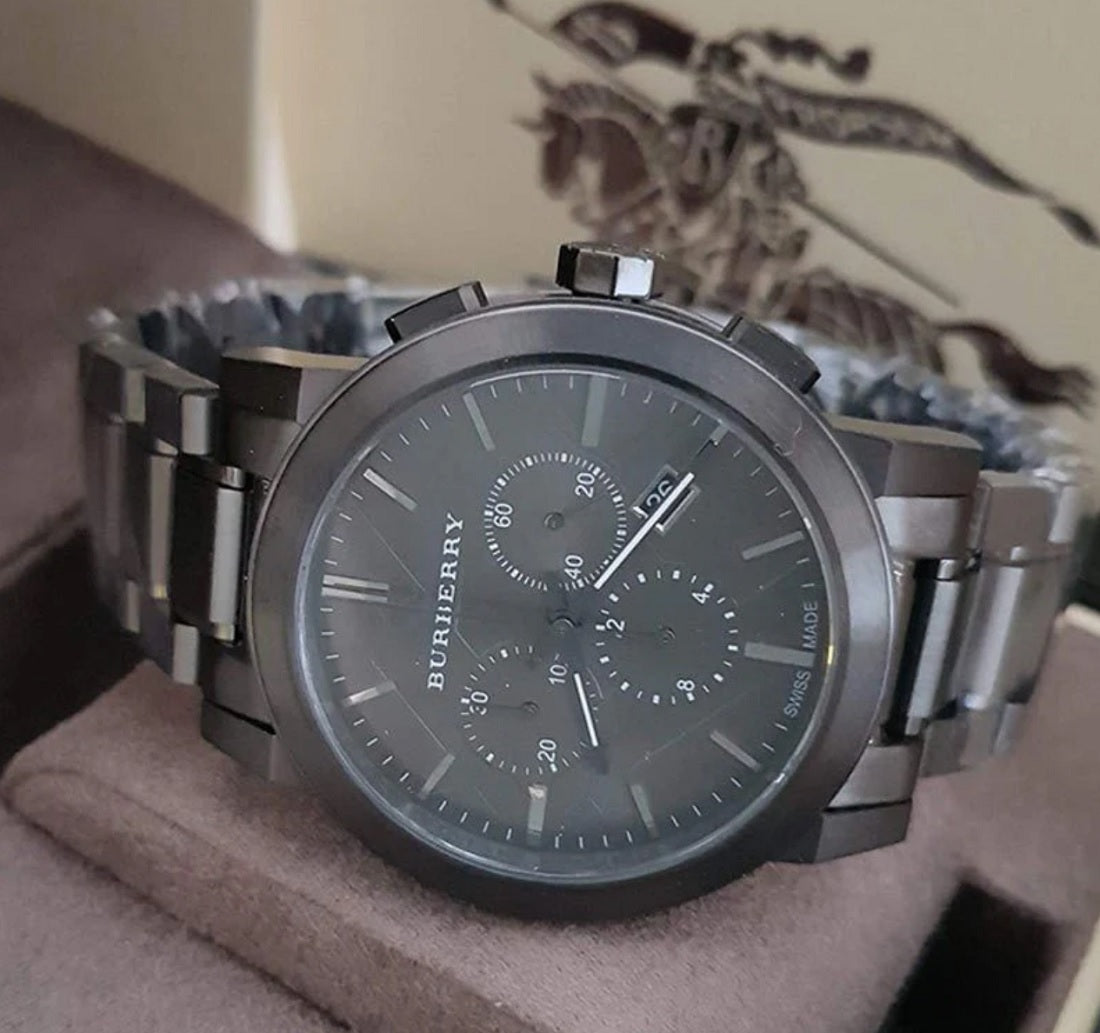 Burberry BU9354 The City men’s watch with dark grey dial and strap displayed in branded watch box