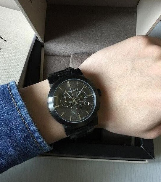 Burberry BU9354 men’s watch with grey strap and grey dial worn on wrist