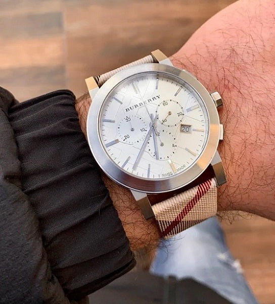 Burberry BU9357 men’s leather strap watch with silver dial worn on wrist