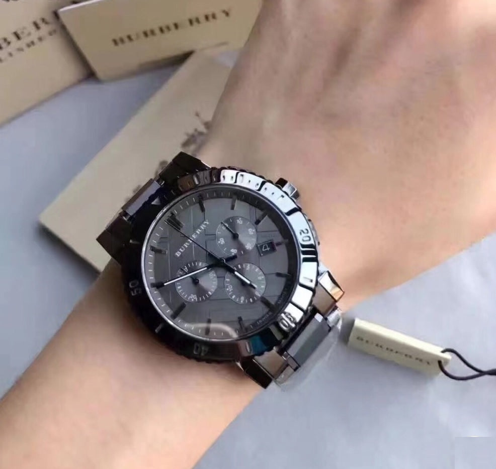 Burberry BU9381 The City watch worn on wrist with grey dial and stainless steel strap