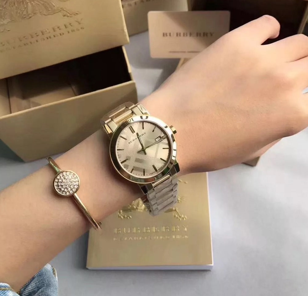 Burberry BU9033 gold unisex watch on wrist upper view – The City 1 series
