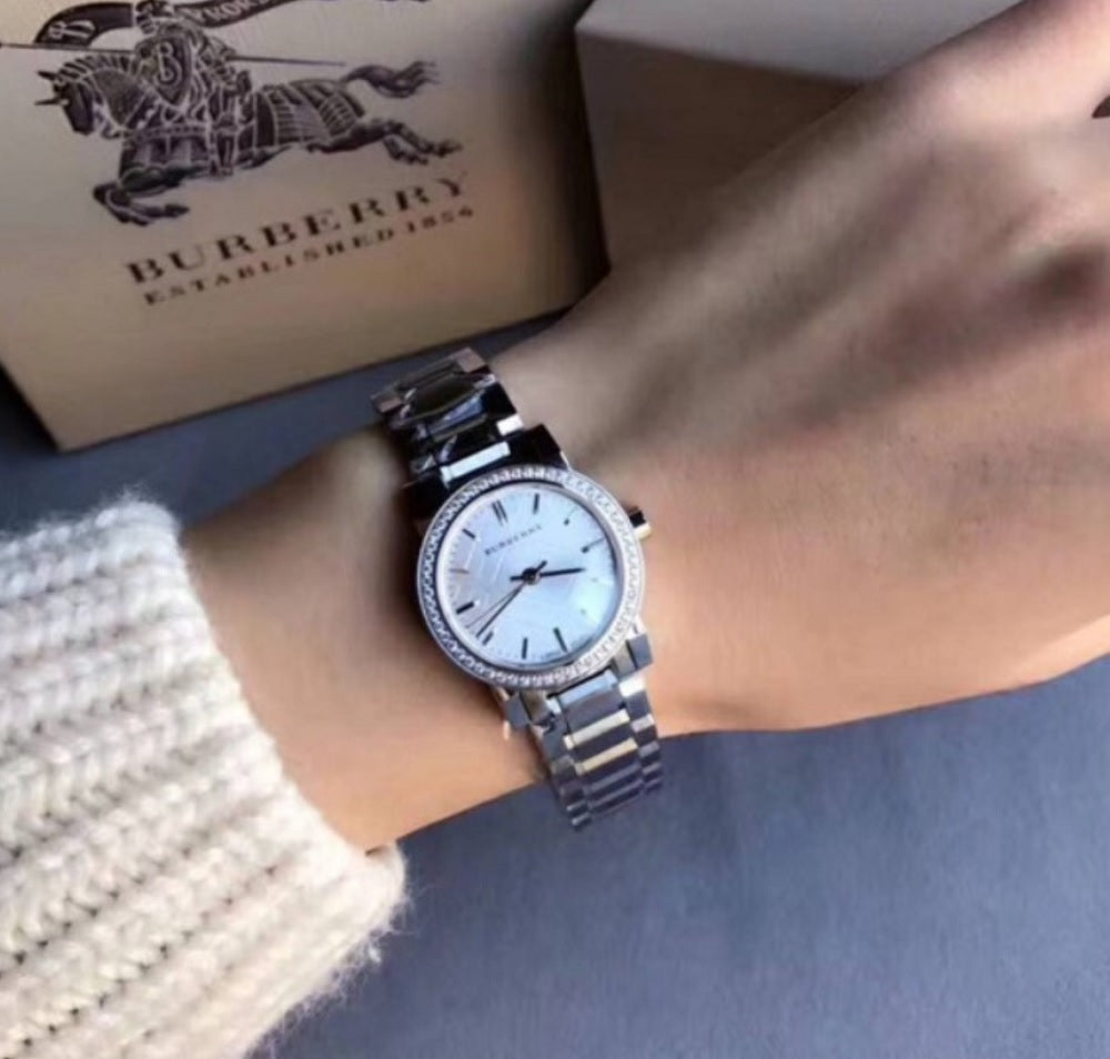 Burberry BU9220 stainless steel women’s watch worn on wrist