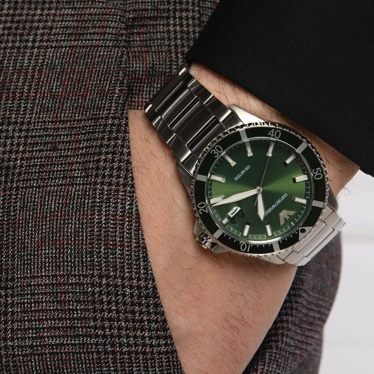 Emporio Armani AR11338 worn on wrist, styled for daily wear with green dial and stainless steel strap