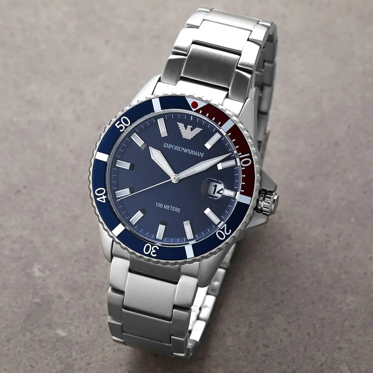 Angled shot of Emporio Armani AR11339 showing crown guard and diver bezel detail