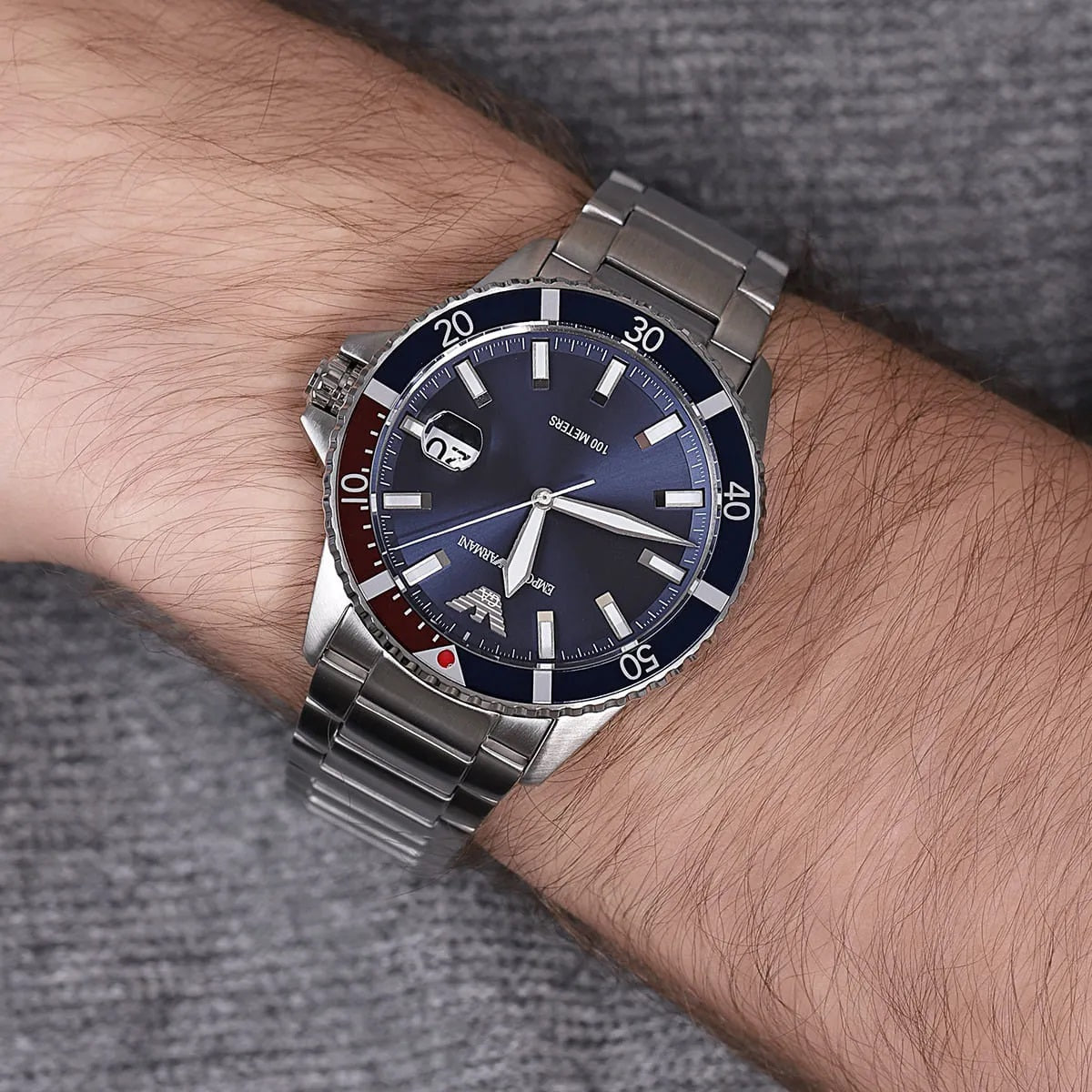 Emporio Armani AR11339 diver watch with blue dial worn on wrist, rugged and sporty look