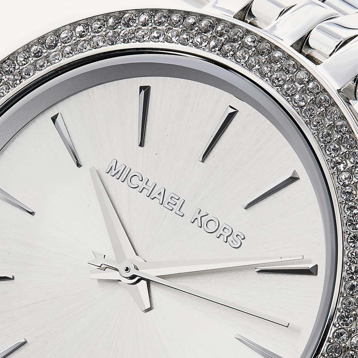 Close-up view of silver dial on Michael Kors MK3190 women’s watch