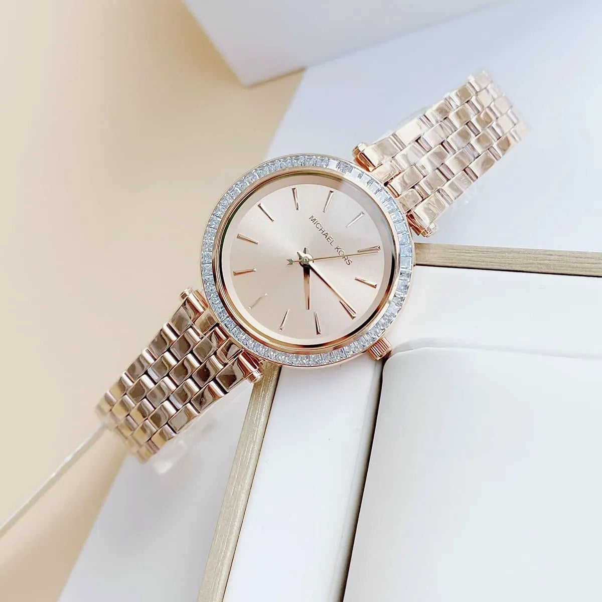 Michael Kors MK3366 women’s watch with stainless steel rose gold strap, rose gold dial, and crystals