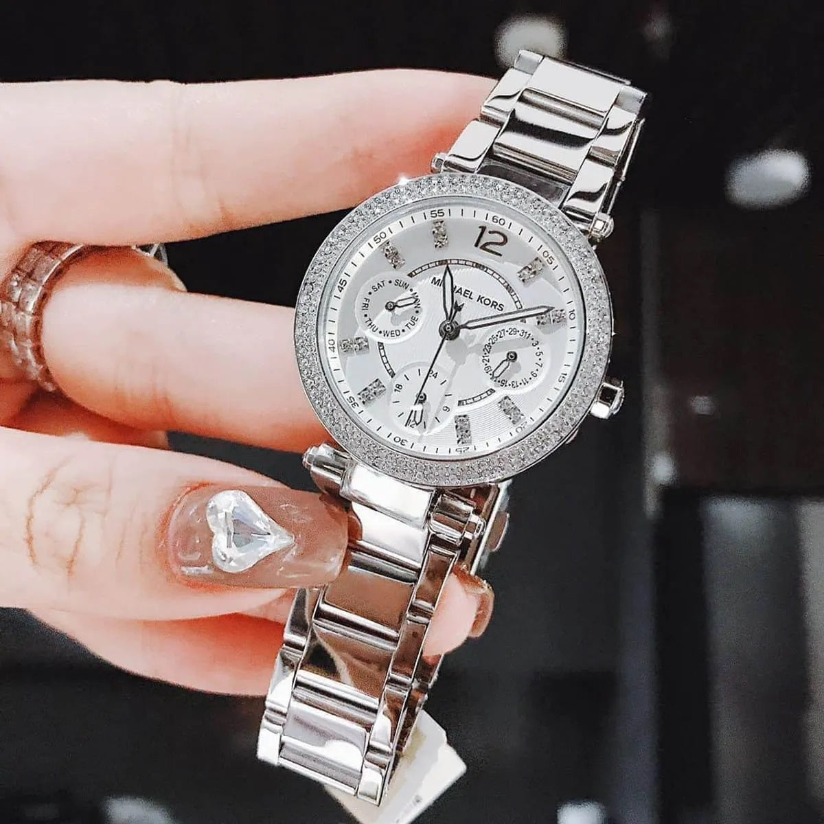 Michael Kors MK5615 women's watch with stainless steel silver strap and matching silver dial
