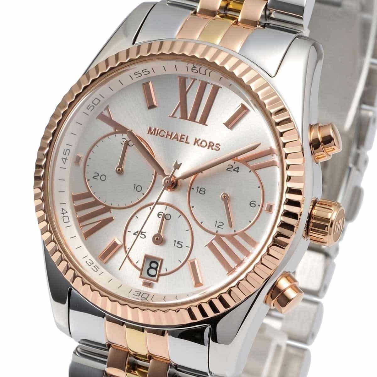 Close-up of the silver dial on Michael Kors MK5735 featuring gold accents