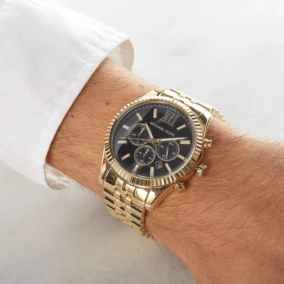 Close-up of dial hands and markers on Michael Kors MK8286 black dial men's watch