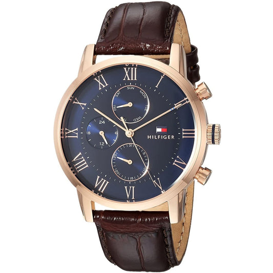 Close-up of blue dial with gold markers on Tommy Hilfiger 1791399 men's watch