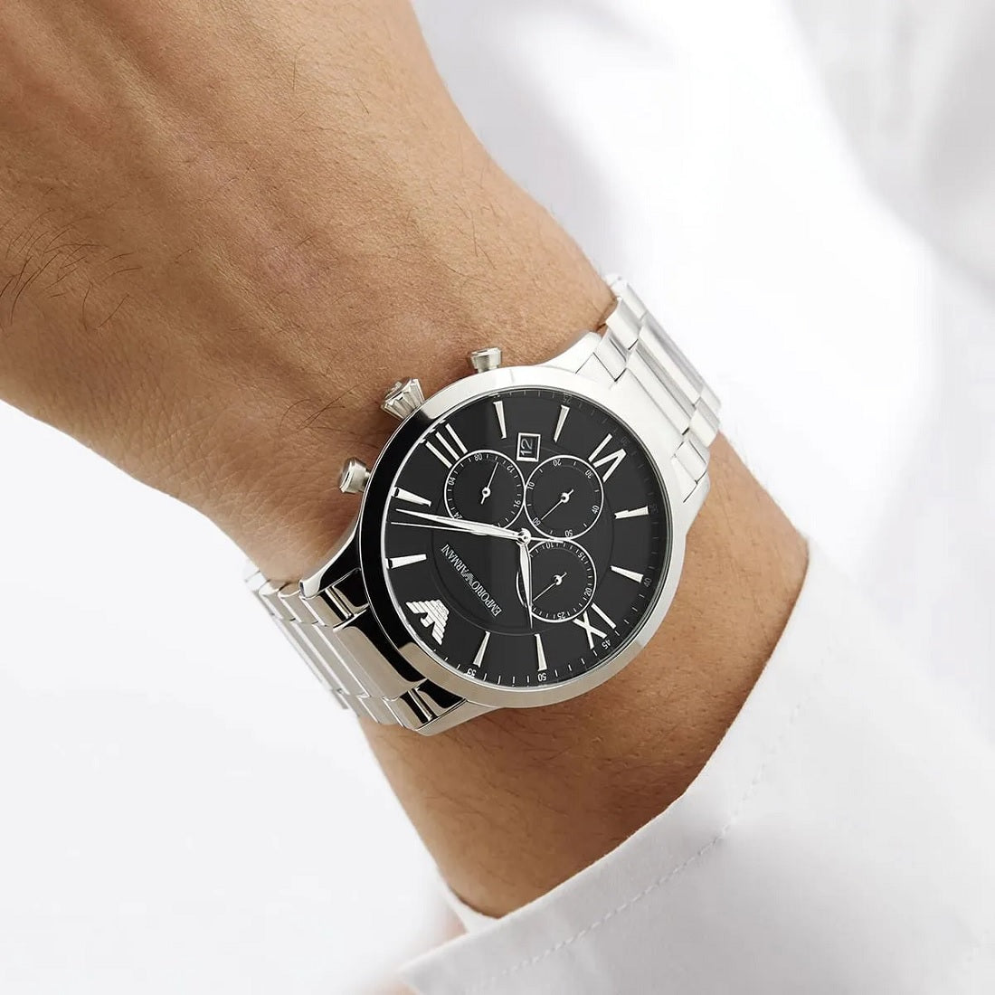 Emporio Armani AR11208 Giovanni worn on wrist with sophisticated black dial and silver strap