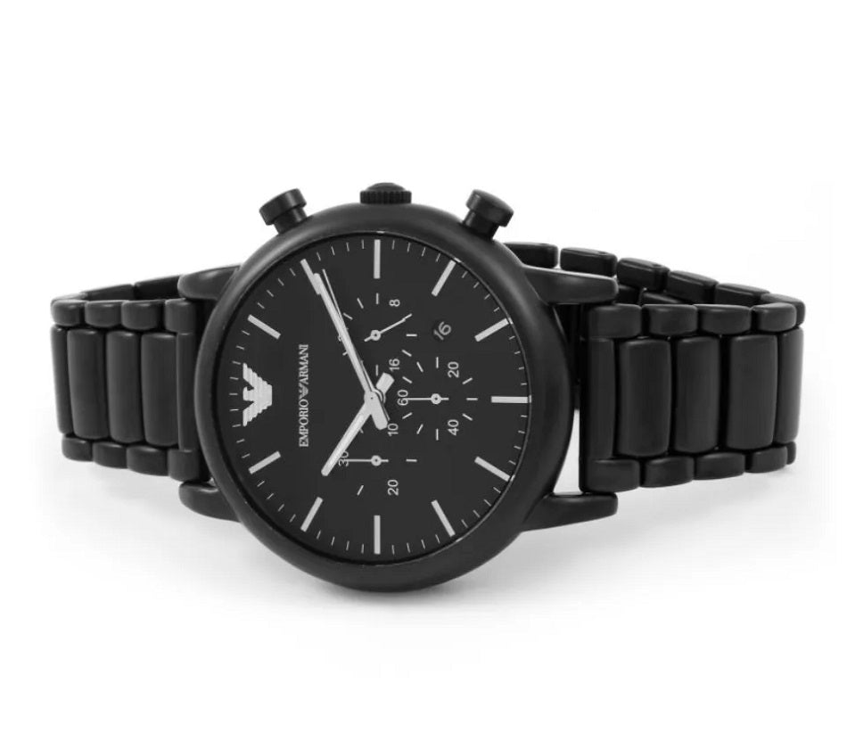 Close-up angled view of the Emporio Armani AR1895 black dial, displaying silver-tone hands, date window, and chronograph sub-dials.