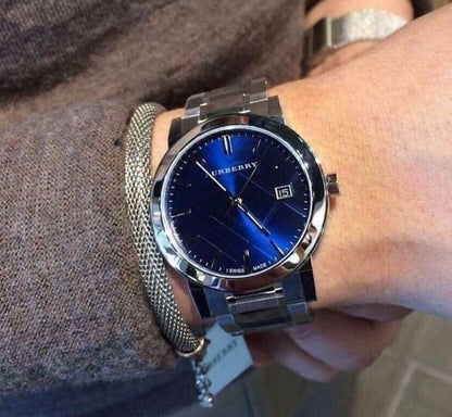 Burberry BU9031 crystal blue dial watch on men's wrist