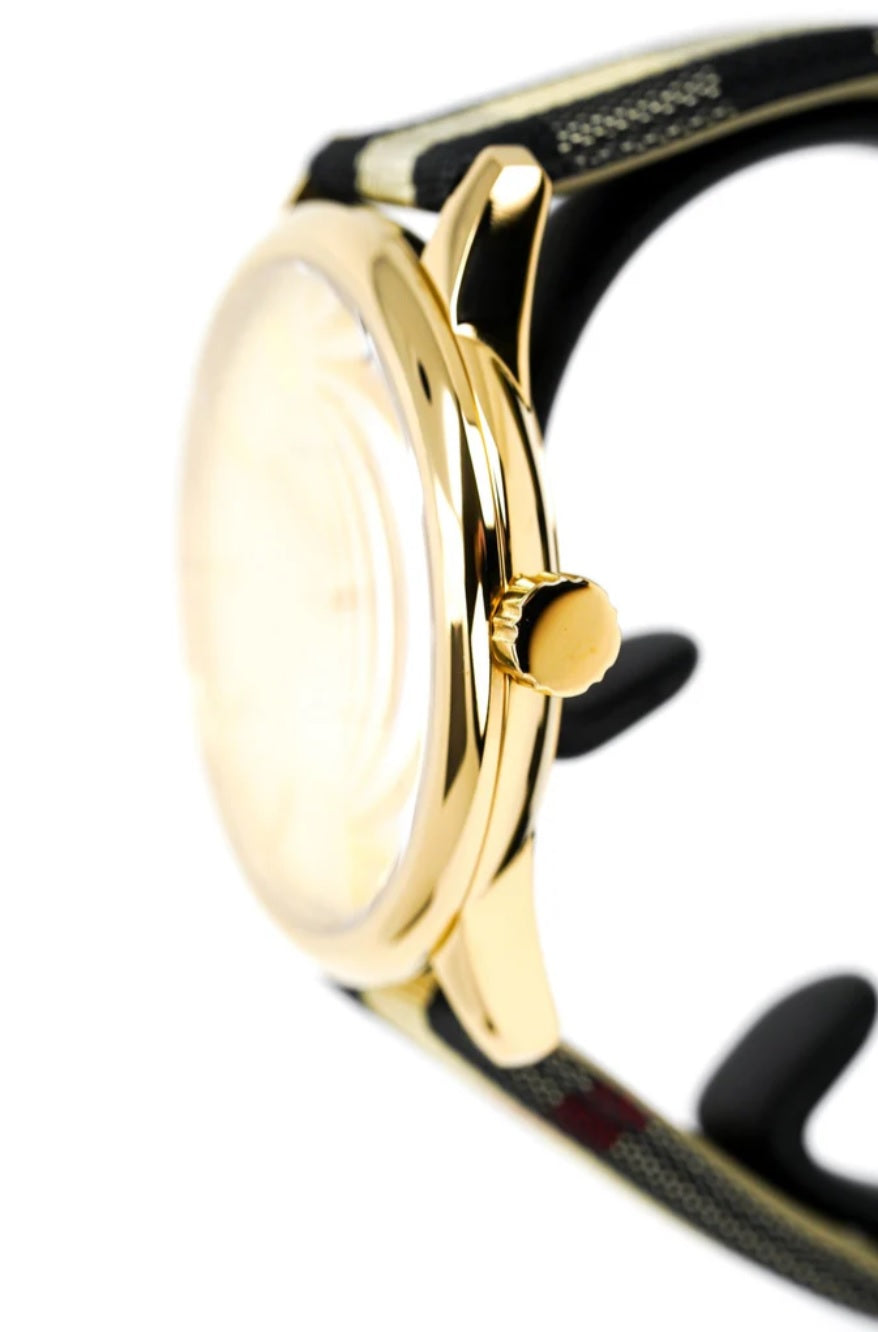 Side profile of Burberry BU10001 men's watch with leather multicolour strap, gold dial, and gold case