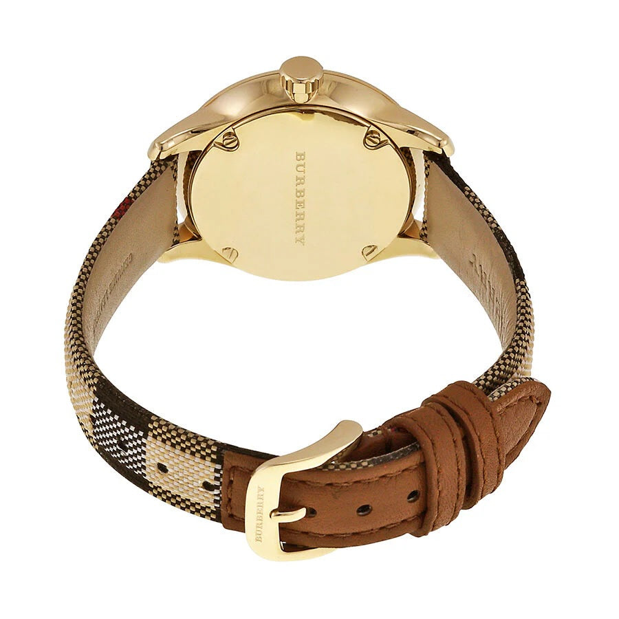 Rear view of the Burberry BU10104 women's watch highlighting the gold-tone tang buckle and solid case back, showing the leather lining of the strap.