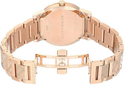 Rear view of the Burberry BU9039 highlighting the open rose gold-tone butterfly deployment clasp and case back.