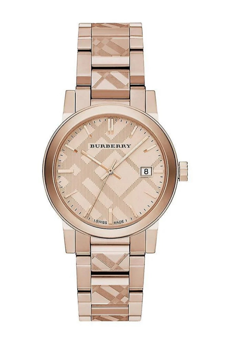 Front view of the Burberry BU9039 The City unisex watch featuring a rose gold-tone finish, date window, and signature check pattern on the dial and bracelet.