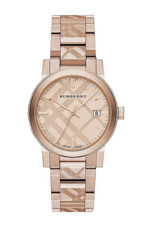 Front view of the Burberry BU9039 The City unisex watch featuring a rose gold-tone finish, date window, and signature check pattern on the dial and bracelet.