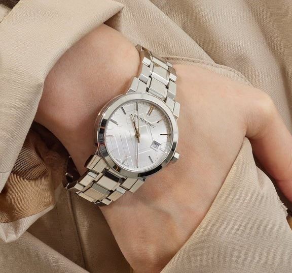 Burberry BU9100 silver women’s watch worn on wrist – The City 2 series