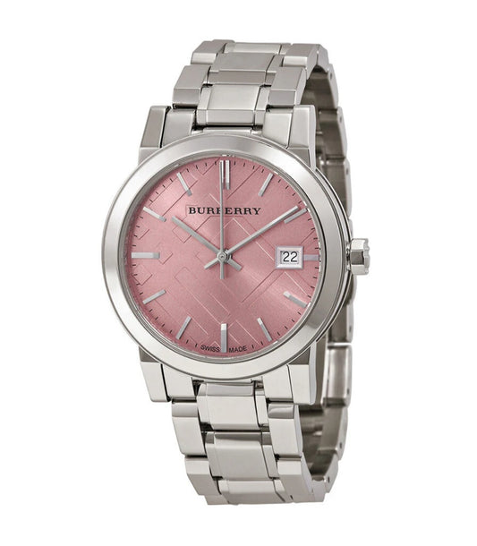 Front view of the Burberry BU9124 women's watch featuring a silver stainless steel bracelet and a metallic pink check-patterned dial with a date window.