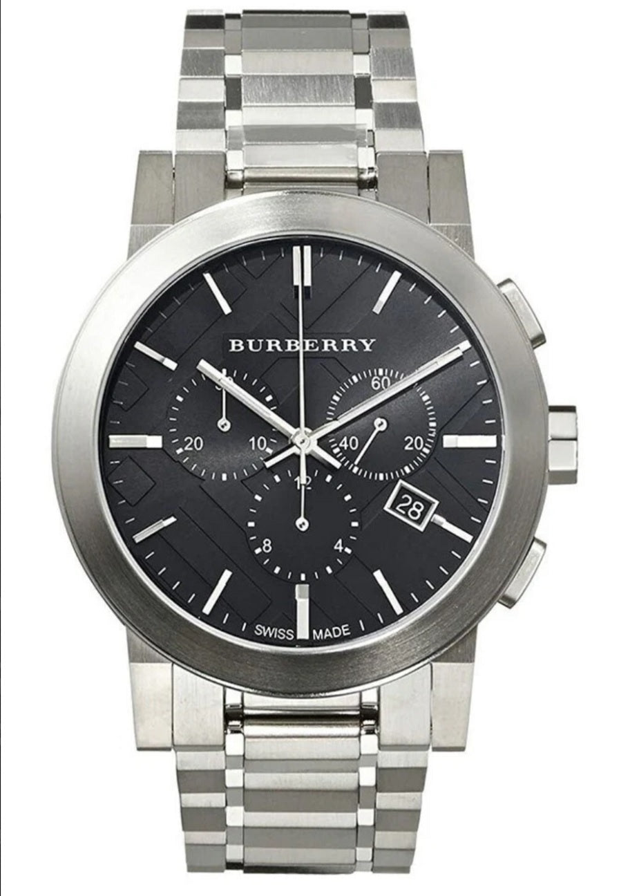 Close-up shot of black dial on Burberry BU9351 The City men’s watch with silver hour markers