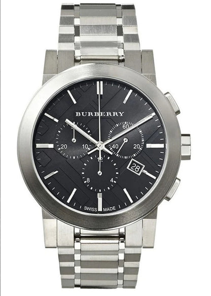 Close-up shot of black dial on Burberry BU9351 The City men’s watch with silver hour markers