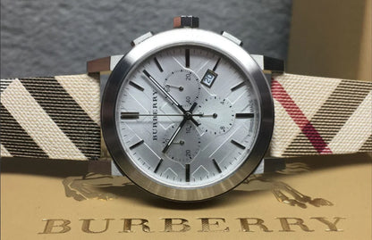 Close-up of silver dial on Burberry BU9357 men’s watch with signature check detailing