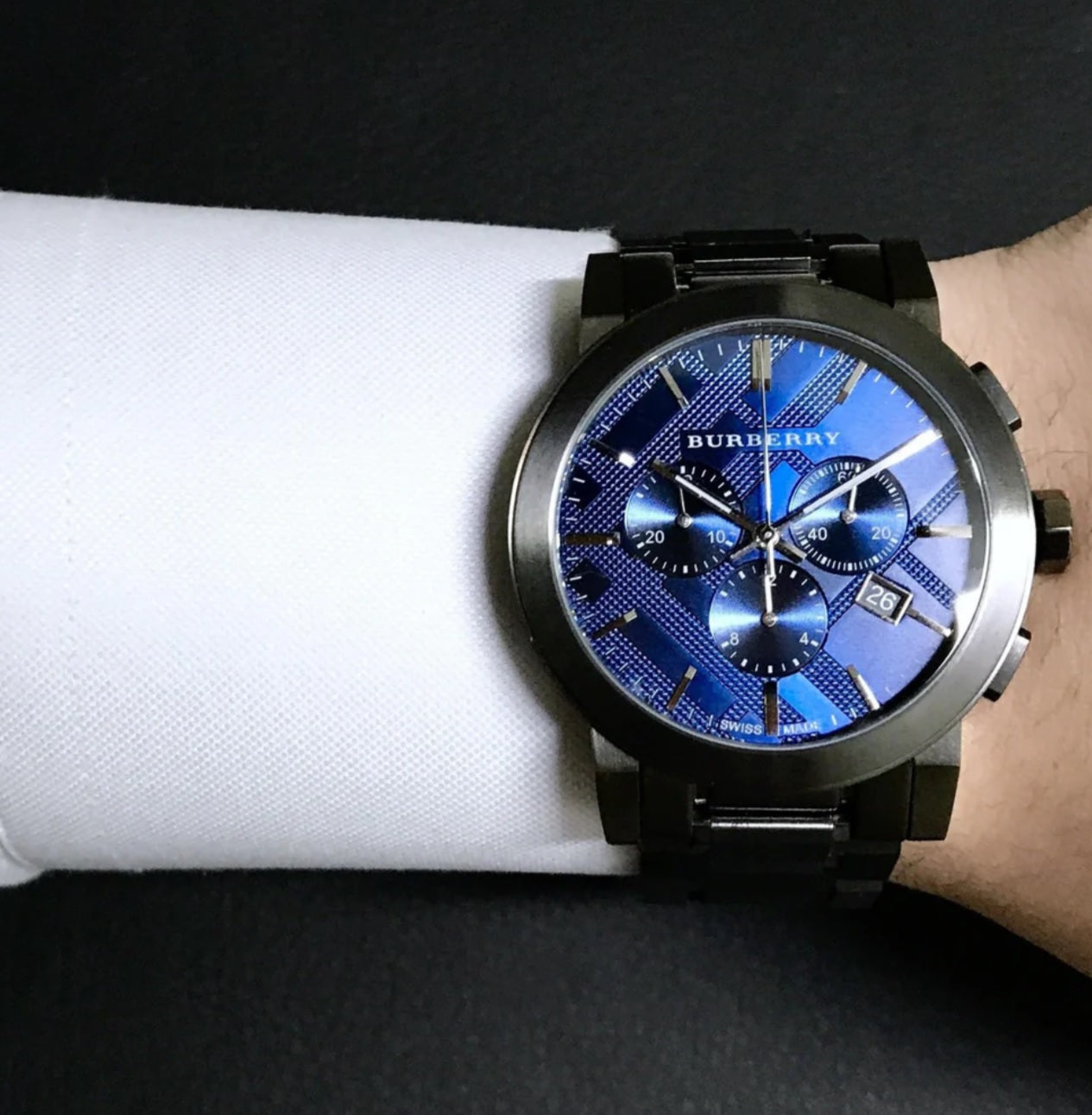 Burberry BU9365 men’s watch worn on wrist showing blue dial and grey strap
