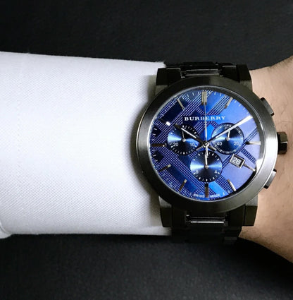 Burberry BU9365 men’s watch worn on wrist showing blue dial and grey strap