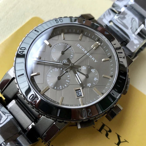 Detailed view of Burberry BU9381 men’s watch showcasing its minimalist grey dial