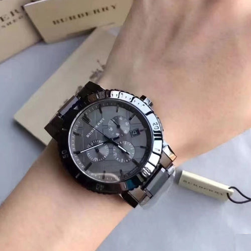 Burberry BU9381 The City watch worn on wrist with grey dial and stainless steel strap