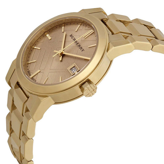 Angled view of Burberry BU9134 women’s The City watch in gold tone
