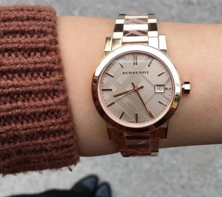 Burberry BU9146 rose gold women’s watch worn on wrist, elegant look