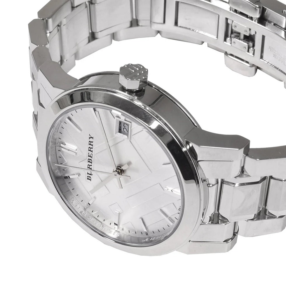 Focused shot of the polished silver bracelet and dial on Burberry BU9100 women’s watch