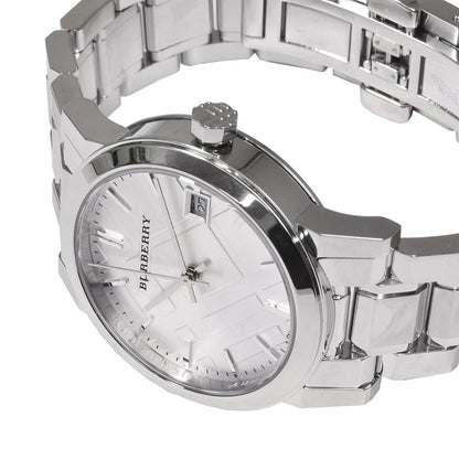 Focused shot of the polished silver bracelet and dial on Burberry BU9100 women’s watch