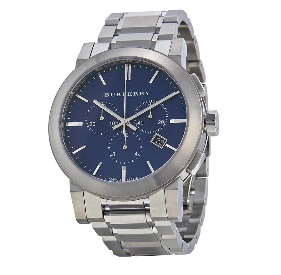 Close-up of Burberry BU9363 watch showing deep blue dial and silver indices