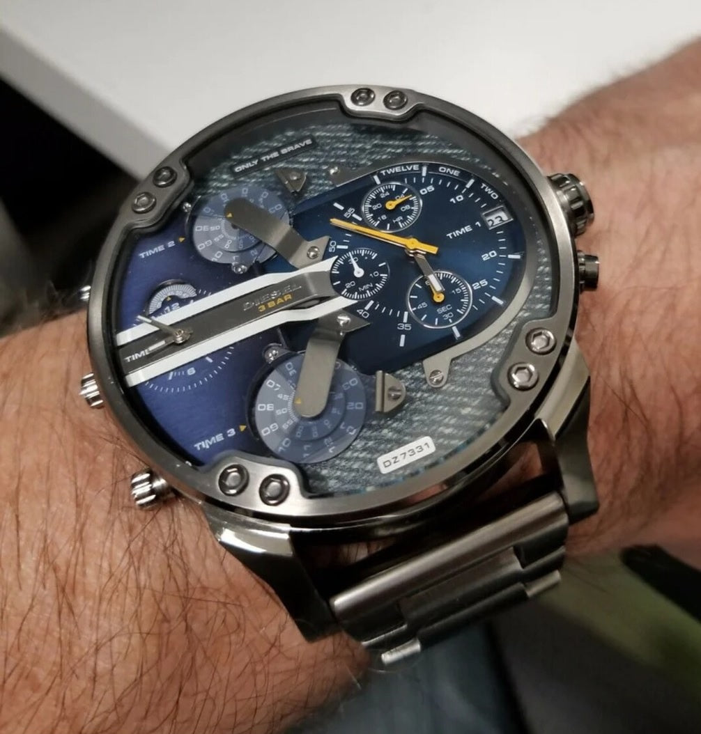 Close-up wrist shot of the massive 57mm Diesel DZ7331 watch demonstrating its bold streetwear styling and oversized fit.