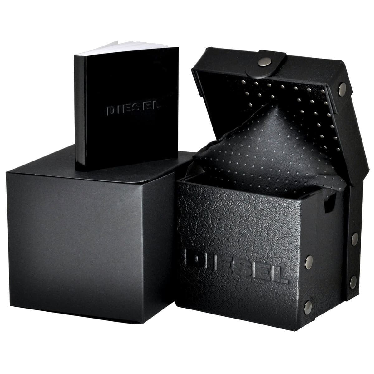 Complete official Diesel watch packaging for the DZ7395, including the black presentation box, cushion, and instruction booklet.