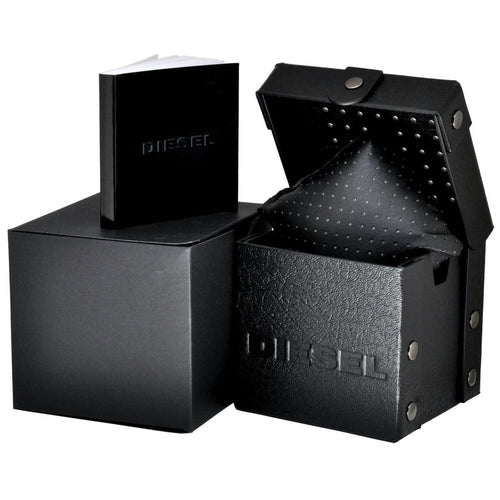 Complete official Diesel watch packaging for the DZ7395, including the black presentation box, cushion, and instruction booklet.