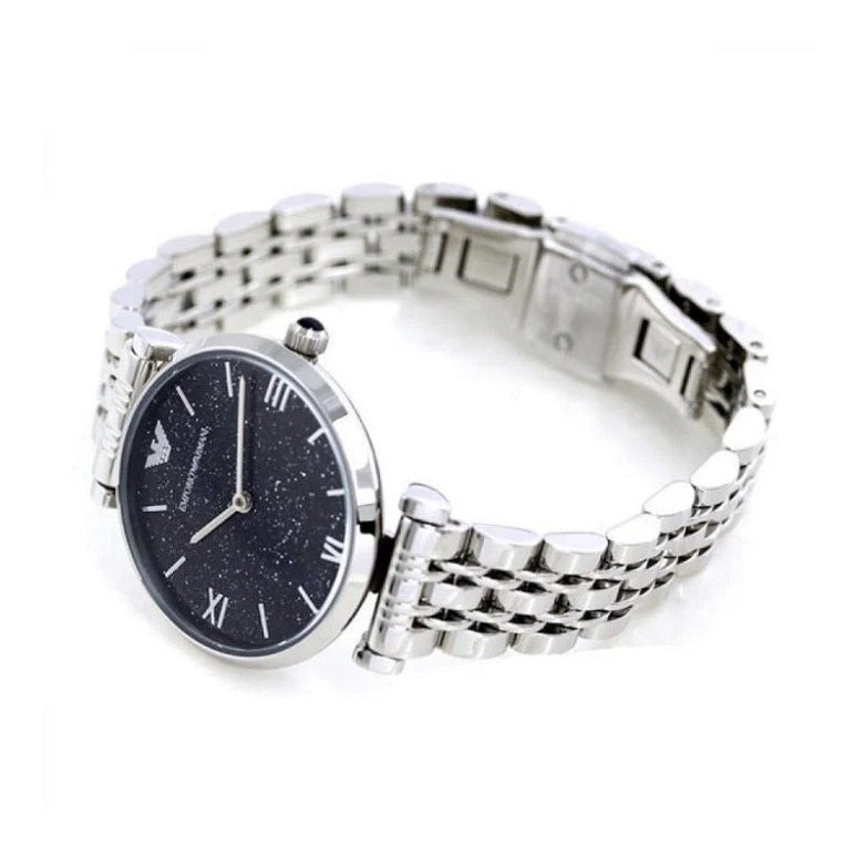 Close-up of the blue dial on Emporio Armani AR11091 Gianni T-Bar women’s watch with silver accents