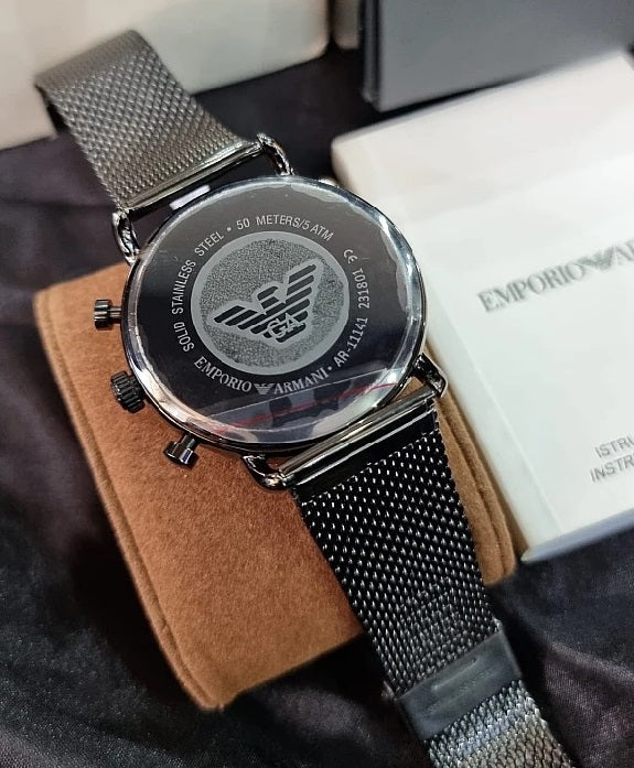 View of the stainless steel case back of the Emporio Armani AR11141 men's watch, showing brand engravings and model details