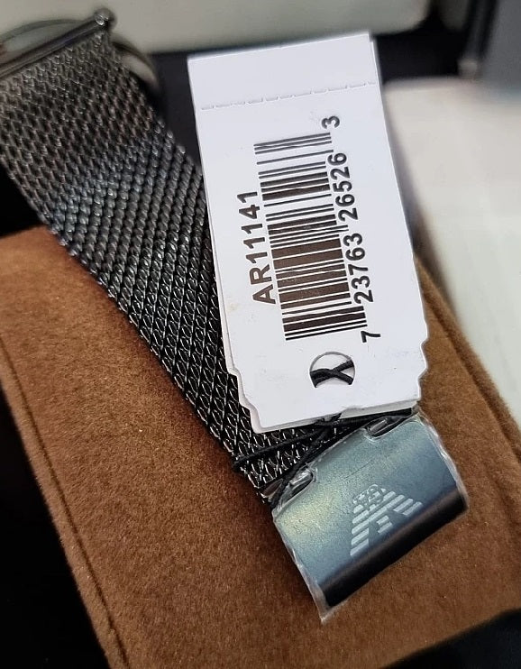 Detailed close-up of the fold-over safety clasp on the grey stainless steel mesh strap of the Emporio Armani AR11141 watch