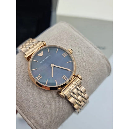 Close-up of black dial on Emporio Armani AR11145 Gianni T-Bar women’s watch with rose gold accents