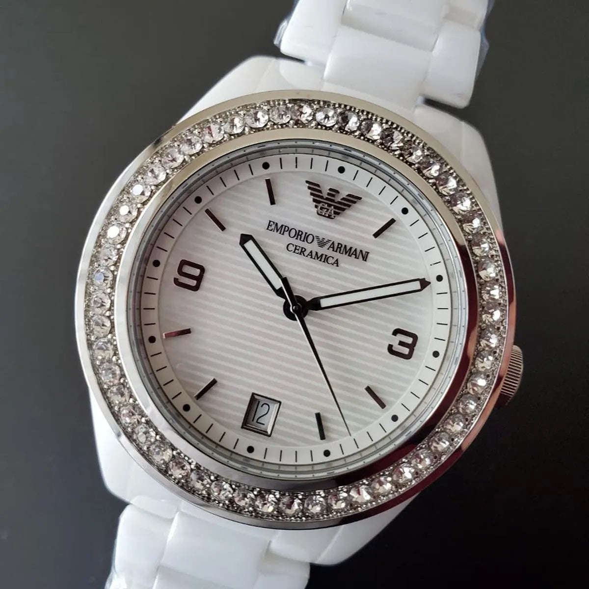 Emporio Armani AR1426 women’s watch with white ceramic strap, mother of pearl dial, and crystals