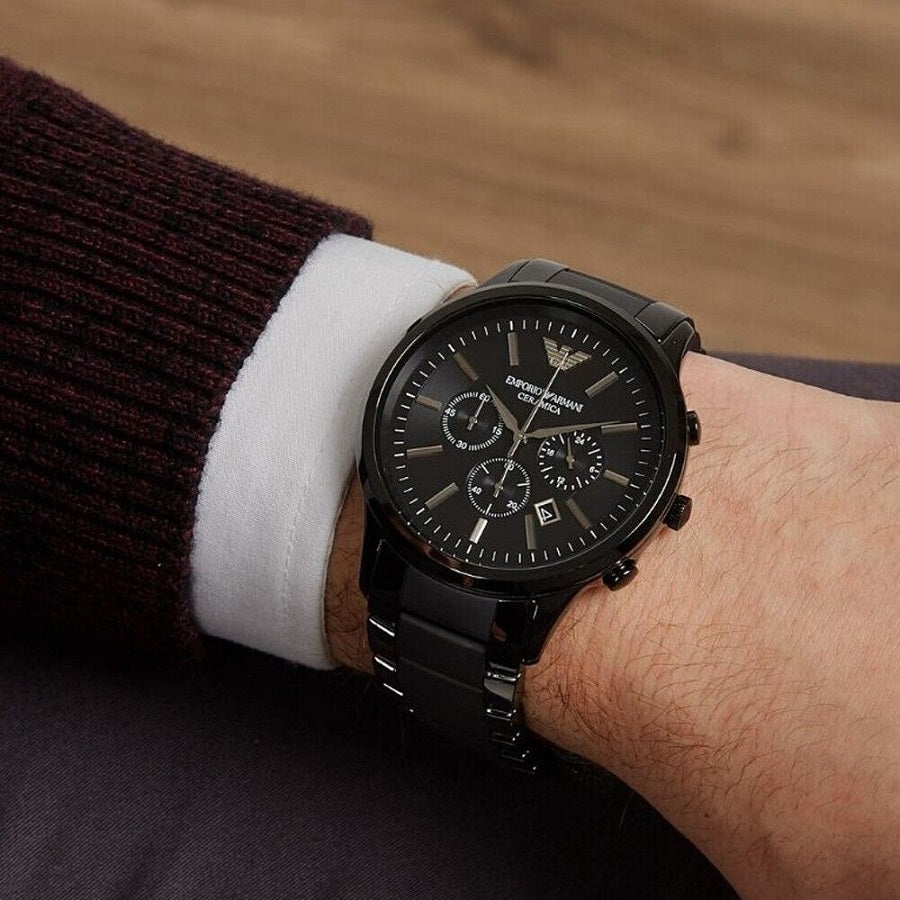 Emporio Armani AR1451 worn on wrist, highlighting the black ceramic strap and chronograph black dial