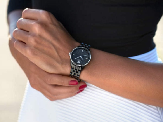 Emporio Armani AR1478 worn on wrist, showcasing elegant black ceramic and crystal dial