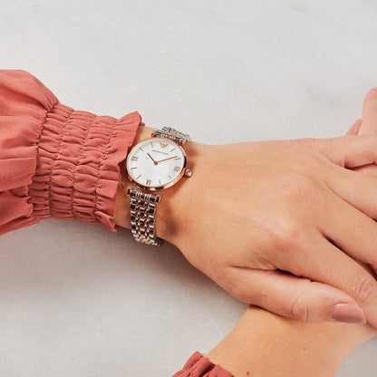 Emporio Armani AR1683 women's watch worn on wrist, silver and rose gold with elegant dial