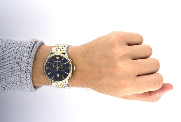 Emporio Armani AR1847 worn on wrist with two-tone stainless steel strap and blue dial